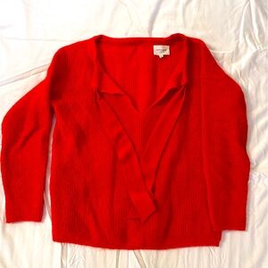 Fiery orange sweater with silk tie detail